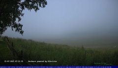 view from Webcam Cansiglio - verso la piana dei "Bech" on 2025-07-15