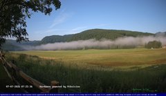view from Webcam Cansiglio - verso la piana dei "Bech" on 2026-07-07