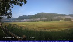 view from Webcam Cansiglio - verso la piana dei "Bech" on 2026-07-07