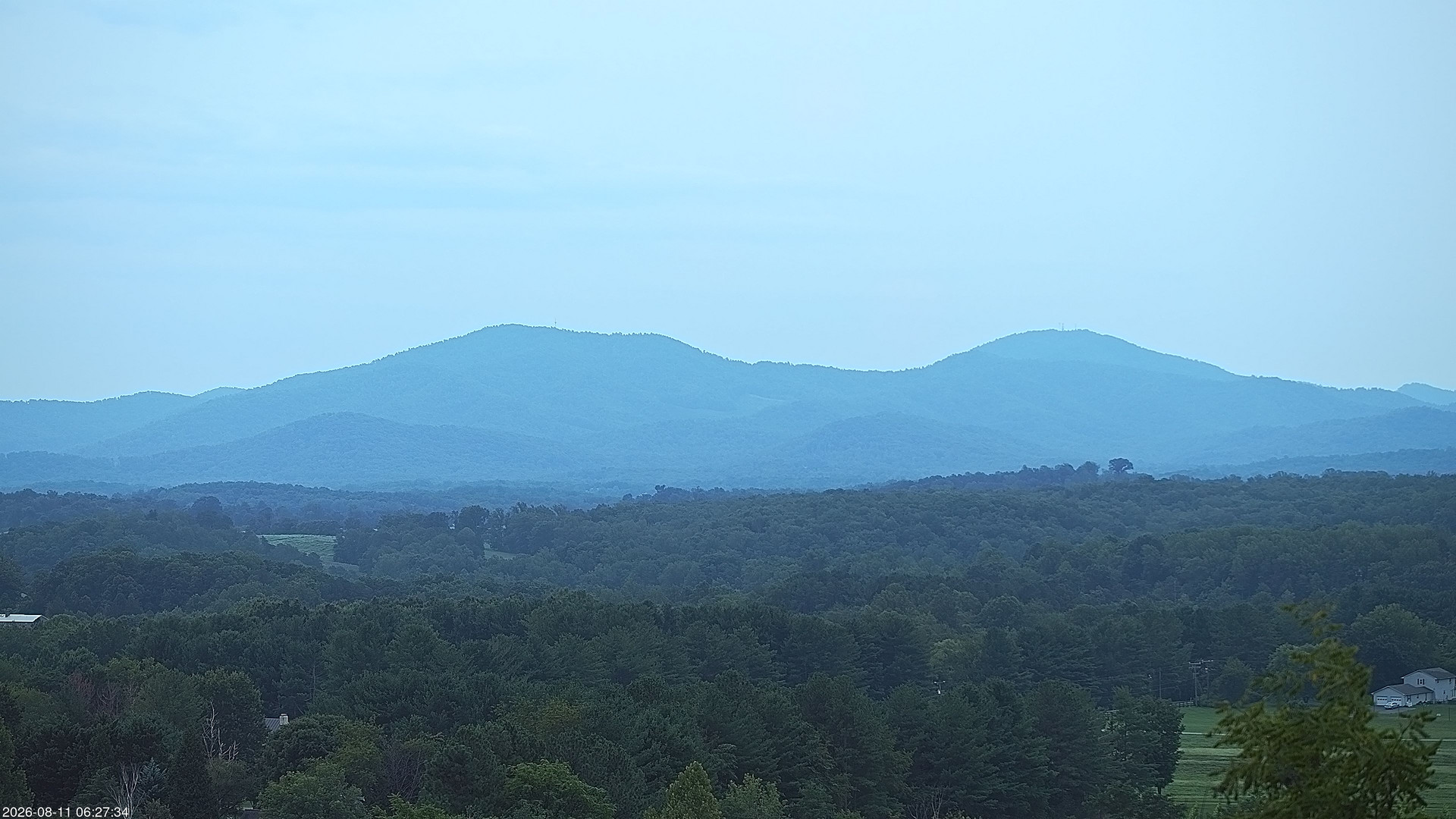 time-lapse frame, 2026-08-11 06:27-20:12 webcam