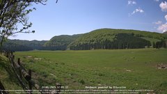view from Webcam Cansiglio - verso la piana dei "Bech" on 2023-05-21