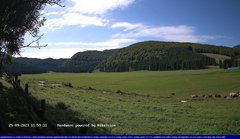 view from Webcam Cansiglio - verso la piana dei "Bech" on 2023-09-25