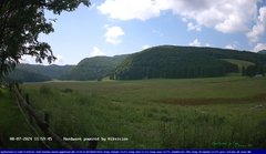 view from Webcam Cansiglio - verso la piana dei "Bech" on 2024-07-08